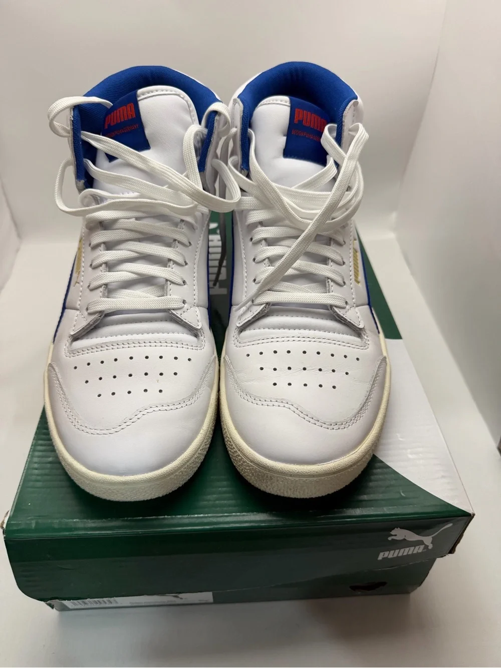 Puma Men's White High-Top Sneakers with Blue and Red Accents